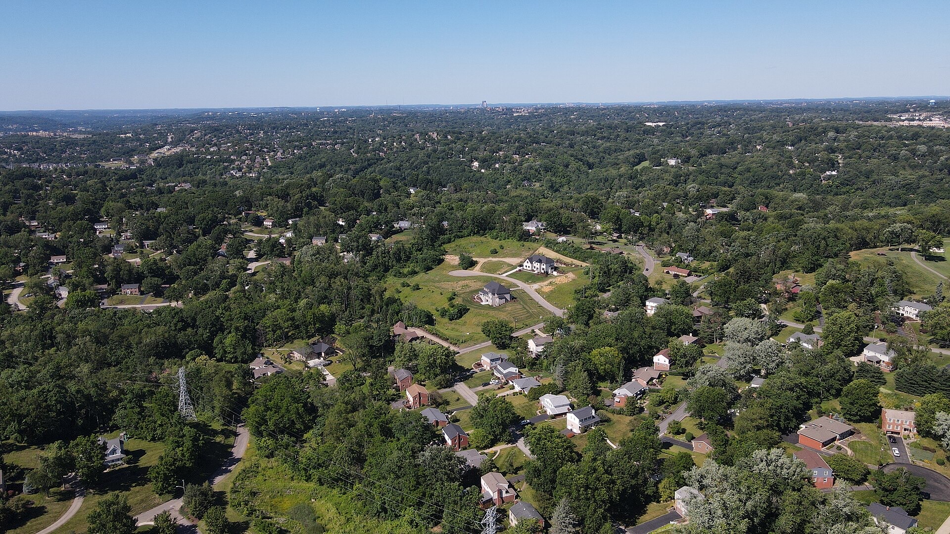 Aerial view of tree-lined residential streets in the Pittsburgh South Hills